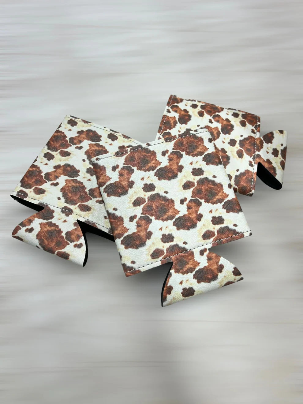 Georgia State Outline-Cow Print Leather Koozie